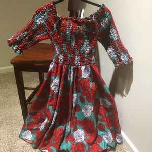 Beautiful authentic v line African dress worn once